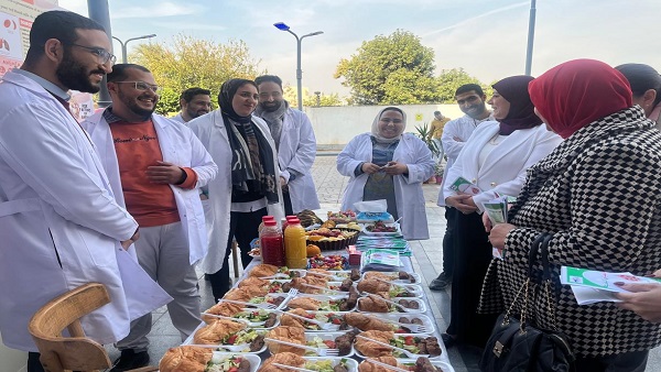 جامعة عين شمس تنظم ملتقى التوعية الصحية تحت شعار تناول الطعام بشكل جيد - الجريدة 4 424