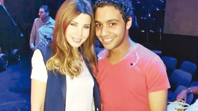 اشتباكات بين معجبين احمد جمال بعد عودته من 