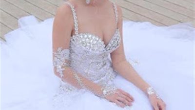 بالصور : نقدم لك احدث خطوط الموضة لفساتين الزفاف لـ 2013