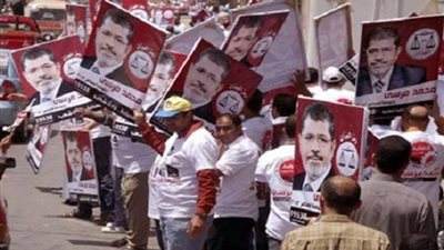 مشادات بين انصار المعزول وحراسة مطبعة البنك المركزي بالهرم 