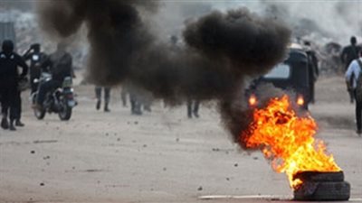 طلاب الإخوان بحلوان يشعلون النيران فى اطارة السيارات امام الجامعة