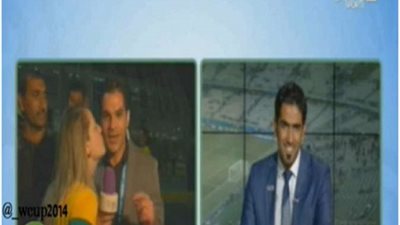 بالفيديو .. مشجعة برازيلية تتحرش بمذيع علي الهواء  وابوتريكة يضحك ..شاهد ماذا حدث