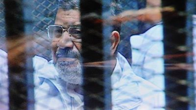 إحالة مرسي وآخرين للمحاكمة في قضية تسريب مستندات لقطر

