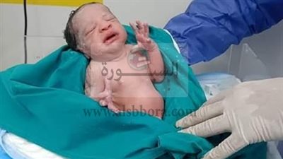 بالصور .. أول عمليه ولادة لأم مصابة بالكورونا داخل مستشفى العزل بإسنا 