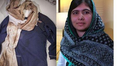 عرض الزي المدرسي لتلميذة ملطخا بالدماء  في اكبر المتاحف الاوروبية ..من تكون ؟