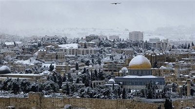 الثلوج تتساقط مجددا علي القدس