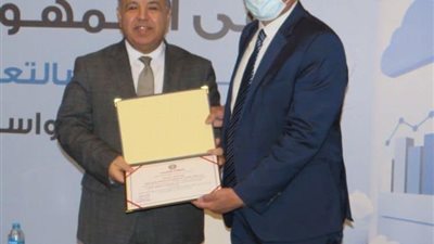 بسبب مساهمته في اعداد قانون المالية العامة الموحد..  وزير المالية يكرم الخبير الدولي حسن عودة بالألمانية بالقاهرة 