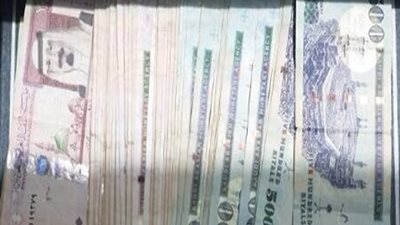 ضبط سورى يحاول تهريب 400 ألف ريال سعودى بمطار القاهرة