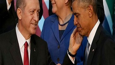 بالصور| أردوغان يصفع أوباما علي خدة بسبب تقبل ميركل