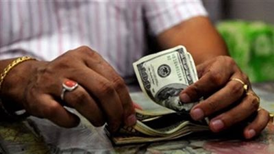 مباحث الاموال العامة باسيوط  ضبط محل أحذية ومكتب سفريات للأتجار بالنقد الاجنبى 